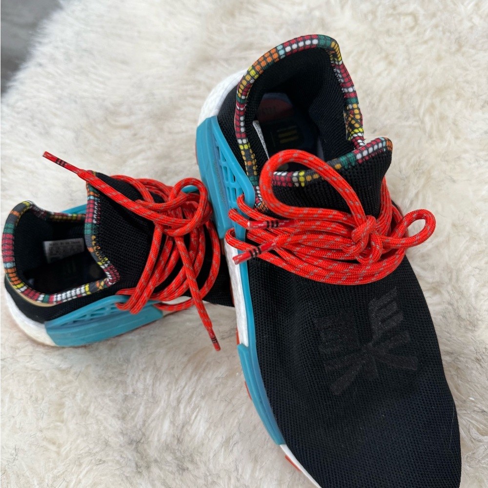 Stylish Black Sneakers with Red Laces